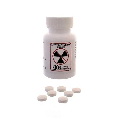 Potassium iodate KI03 anti-radiation tablets bottle with six white tablets on surface