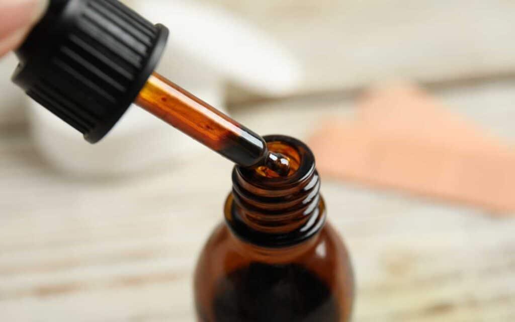 Close-up of Magnascent Nascent Iodine dropper and amber glass bottle on a light surface