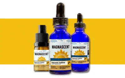 Three Magnascent Nascent Iodine supplement bottles with blue glass and yellow labels